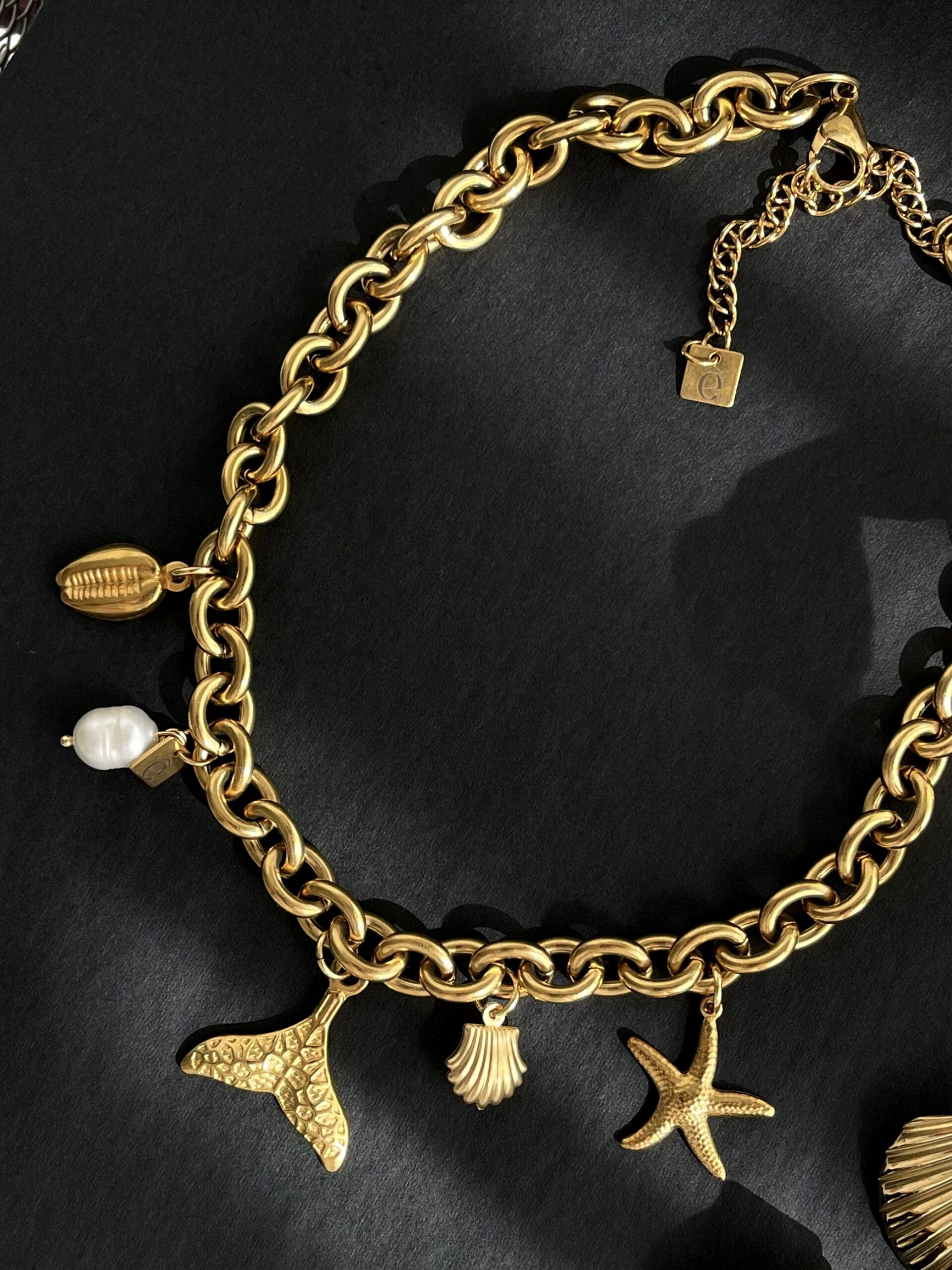 9f2249_ce5452164cad4b2a86d9078e84027a07mv2 Colar Maré Alta - Image 1